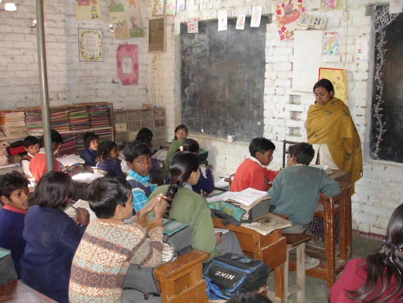 Village classroom with children and teacher